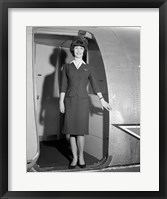 Framed 1960s Smiling Stewardess Standing In Doorway