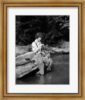 Framed 1920s 1930s Woman Sitting On Rock