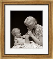 Framed 1930s Mother Kissing Bottom Of Baby'S Foot
