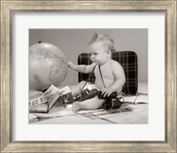 Framed 1960s Baby Seated Looking At Globe