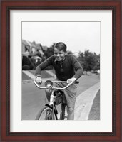 Framed 1930s Smiling Boy Riding Bicycle