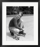Framed 1930s Smiling Boy Fastening On Metal Roller Skates