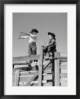 Framed 1950s Two Young Boys Dressed As Cowboys