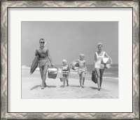 Framed 1950s Family Of Four Walking Towards Camera