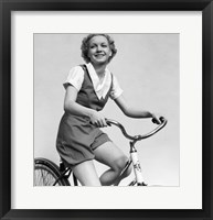 Framed 1930s Smiling Blonde Woman Riding Bicycle