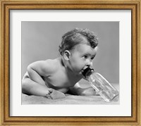 Framed 1950s Baby Leaning Forward Drinking From Bottle