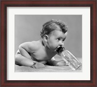Framed 1950s Baby Leaning Forward Drinking From Bottle