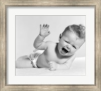 Framed 1950s Baby Lying On Stomach Laughing