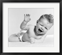 Framed 1950s Baby Lying On Stomach Laughing