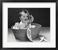 Framed 1940s Baby In Wicker Basket With Happy New Year Banner