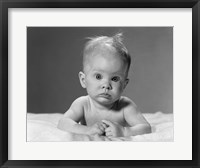 Framed 1960s Baby Lying On Stomach With Messy Hair