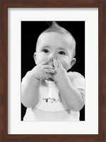 Framed 1950s Baby Covering Mouth With Hands