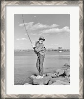 Framed 1980s Boy Fishing On Riverbank