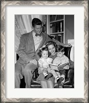 Framed 1940s Father Watching  Mother Reading To Son And Daughter