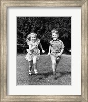 Framed 1930s 1940s Boy And Girl Running In Backyard