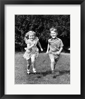 Framed 1930s 1940s Boy And Girl Running In Backyard