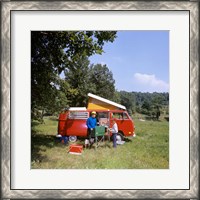 Framed 1970s Father And Son Cooking At Campsite