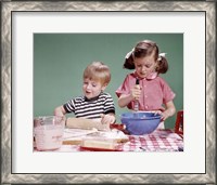 Framed 1960s  Boy And Girl Mixing Ingredients For Cookies