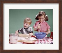 Framed 1960s  Boy And Girl Mixing Ingredients For Cookies