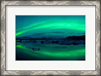 Framed Aurora Borealis or Northern Lights over Jokulsarlon Lagoon, Iceland