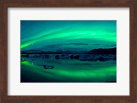 Framed Aurora Borealis or Northern Lights over Jokulsarlon Lagoon, Iceland