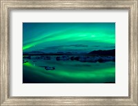 Framed Aurora Borealis or Northern Lights over Jokulsarlon Lagoon, Iceland